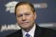 Agent Scott Boras listens during a news conference with the Miami Marlins, Tuesday, Jan. 19, 2016, in Miami. Boras' client pitcher Wei-Yin Chen, finalized an $80 million, five-year contract with the Marlins. (AP Photo/Lynne Sladky)