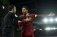 Liverpool's German midfielder Emre Can (R) argues with the linesman after the penalty decision during the English Premier League football match between Liverpool and Tottenham Hotspur at Anfield in Liverpool, north west England on February 4, 2018. / AFP PHOTO / PAUL ELLIS / RESTRICTED TO EDITORIAL USE. No use with unauthorized audio, video, data, fixture lists, club/league logos or 'live' services. Online in-match use limited to 75 images, no video emulation. No use in betting, games or single club/league/player publications. / (Photo credit should read PAUL ELLIS/AFP/Getty Images)
