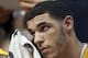 Los Angeles Lakers guard Lonzo Ball (2) wipes his face with a towel as he sits on then bench in the first half of an NBA basketball game against the Dallas Mavericks on Saturday, Jan. 13, 2018, in Dallas. (AP Photo/Tony Gutierrez)