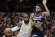Cleveland Cavaliers' LeBron James, left, drives against Minnesota Timberwolves' Karl-Anthony Towns in the first half of an NBA basketball game, Wednesday, Feb. 7, 2018, in Cleveland. (AP Photo/Tony Dejak)