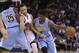 Denver Nuggets' Emmanuel Mudiay (0) dribbles around Golden State Warriors' Stephen Curry on a screen from Kenneth Faried (35) during the first half of an NBA preseason basketball game Tuesday, Oct. 13, 2015, in Oakland, Calif. (AP Photo/Marcio Jose Sanchez)