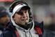 New England Patriots offensive coordinator Josh McDaniels watches from the sideline during the second half of an NFL divisional playoff football game against the Tennessee Titans, Saturday, Jan. 13, 2018, in Foxborough, Mass. (AP Photo/Charles Krupa)