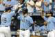 ST. PETERSBURG, FL - OCTOBER 1: Curt Casali #19 of the Tampa Bay Rays celebrates his home run with teammates Daniel Robertson #29 and Curt Casali #54 during the fifth inning of the game against the Baltimore Orioles at Tropicana Field on October 1, 2017 in St. Petersburg, Florida. (Photo by Joseph Garnett Jr./Getty Images)