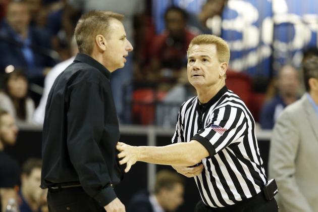 Official Larry Spaulding holds back Colorado State coach Larry Eustache before calling a technical foul on him during the second half of the team's NCAA college basketball game against Nevada in the Mountain West Conference tournament championship Saturday, March 11, 2017, in Las Vegas. Nevada won 79-71. (AP Photo/Isaac Brekken)