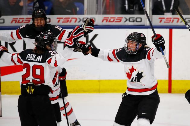 PLYMOUTH, MI - APRIL 07: Brianne Jenner #19 of Canada celebrates her third period goal with Marie-Philip Poulin #29 and Natalie Spooner #24 while playing the the United States in the gold medal game at the 2017 IIHF Woman's World Championships at USA Hockey Arena on April 7, 2017 in Plymouth, Michigan. (Photo by Gregory Shamus/Getty Images)