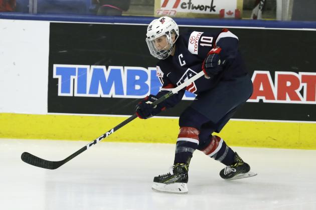 United States forward Meghan Duggan passes during the first period of the gold-medal game of the women's world hockey championships, Friday, April 7, 2017, in Plymouth, Mich. (AP Photo/Carlos Osorio)
