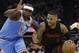 Portland Trail Blazers guard Damian Lillard, right, drives against Sacramento Kings forward Zach Randolph during the second half of an NBA basketball game Friday, Feb. 9, 2018, in Sacramento, Calif. The Trail Blazers won 118-100. (AP Photo/Rich Pedroncelli)