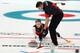 PYEONGCHANG-GUN, SOUTH KOREA - FEBRUARY 08: Kaitlyn Lawes and John Morris of Canada deliver a stone against Norway in the Curling Mixed Doubles Round Robin Session 1 during the PyeongChang 2018 Winter Olympic Games at Gangneung Curling Centre on February 8, 2018 in Pyeongchang-gun, South Korea. (Photo by Ronald Martinez/Getty Images)