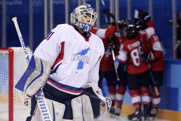 South Korea's goalie Shin So-jung, of the combined Koreas team, reacts after giving up a goal by Phoebe Staenz (88), of Switzerland, during the second period of the preliminary round of the women's hockey game at the 2018 Winter Olympics in Gangneung, South Korea, Saturday, Feb. 10, 2018. (AP Photo/Frank Franklin II)