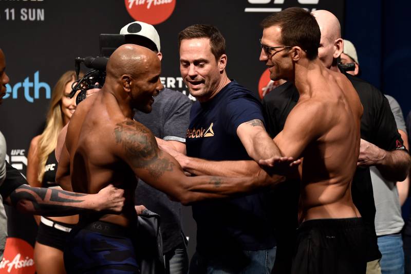 PERTH, AUSTRALIA - FEBRUARY 10: (L-R) Opponents Yoel Romero of Cuba and Luke Rockhold face off during the UFC 221 weigh-in at Perth Arena on February 10, 2018 in Perth, Australia. (Photo by Jeff Bottari/Zuffa LLC/Zuffa LLC via Getty Images)