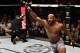 PERTH, AUSTRALIA - FEBRUARY 11: (R-L) Yoel Romero of Cuba celebrates his knockout victory over Luke Rockhold in their interim middleweight title bout during the UFC 221 event at Perth Arena on February 11, 2018 in Perth, Australia. (Photo by Jeff Bottari/Zuffa LLC/Zuffa LLC via Getty Images)