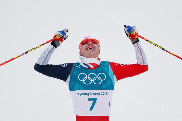 Norway's Simen Hegstad Krueger crosses the finish line to win gold in the men's 15km + 15km cross-country skiathlon at the Alpensia cross country ski centre during the Pyeongchang 2018 Winter Olympic Games on February 11, 2018 in Pyeongchang. / AFP PHOTO / Odd ANDERSEN (Photo credit should read ODD ANDERSEN/AFP/Getty Images)