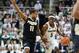 P.J. Thompson (11) and Cassius Winston (5)