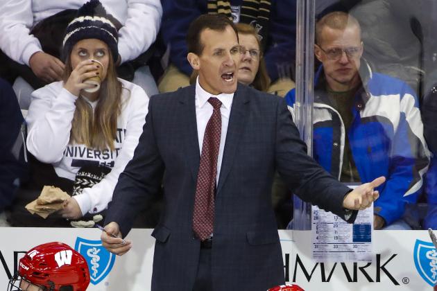 FILE - In this Jan. 5, 2018, file photo, Wisconsin coach Tony Granato stands behind his bench during the team's NCAA hockey game against Penn State in State College, Pa. Granato, coach of the U.S. men's team for the Olympics, said the U.S. “has lots of pieces that other teams and countries don't know about” and wonders if his team will be overlooked. (AP Photo/Gene J. Puskar, File)