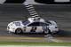 Brad Keselowski crosses the finish line to win the NASCAR Clash auto race at Daytona International Speedway, Sunday, Feb. 11, 2018, in Daytona Beach, Fla. (AP Photo/Terry Renna)