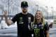 NASCAR driver Kurt Busch, left, jokes with NHRA drag racer Brittany Force, right, after beating her in a best of three drag race competition at Charlotte Motor Speedway's ZMax Dragway in Concord, N.C., during a news conference Wednesday, Sept. 7, 2016. The drivers raced identical Chevrolet Camaros before Busch drove Force around the oval race track. (AP Photo/Chuck Burton)