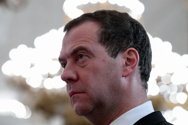 Russian Prime Minister Dmitry Medvedev attends a ceremony to bestow state awards on military personnel who fought in Syria, at the Kremlin in Moscow on December 28, 2017. / AFP PHOTO / POOL / Kirill KUDRYAVTSEV (Photo credit should read KIRILL KUDRYAVTSEV/AFP/Getty Images)