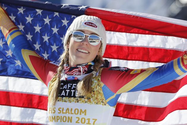 Mikaela Shiffrin, of the U.S.A., celebrates her gold medal in the women's slalom at the alpine skiing World Championships in St. Moritz, Switzerland, Saturday, Feb. 18, 2017. (AP Photo/Marco Trovati)