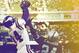 FILE - This Oct. 9, 2000, file photo shows Minnesota Vikings wide receiver Randy Moss (84) jumping into the crowd to celebrate his 42-yard touchdown pass from Daunte Culpepper during the fourth quarter against the Tampa Bay Buccaneers, in Minneapolis. Moss is calling it a career after 13 seasons in the NFL as one of the most dynamic and polarizing players the league has ever seen. (AP Photo/Paul Battaglia, File)