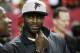 FILE - In this Jan. 1, 2017, file photo, former Atlanta Falcons quarterback Michael Vick stands on the sidelines before NFL football game between the Falcons and the New Orleans Saints in Atlanta. Vick told Fox Sports 1 Monday, July 17, 2017, that former San Francisco 49ers quarterback Colin Kaepernick should get a haircut in order to