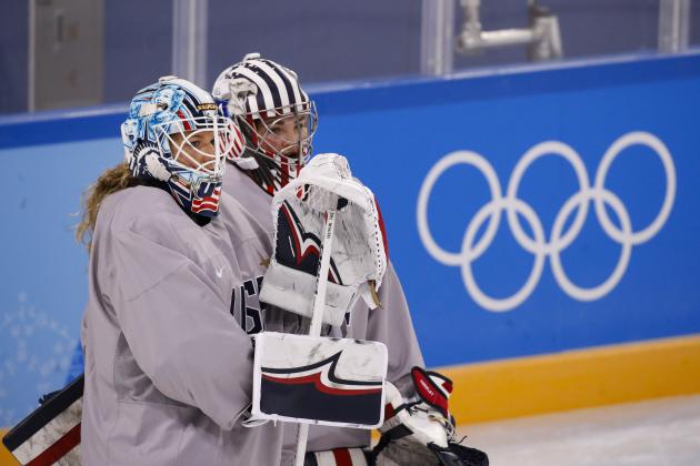 FILE - In this Feb. 4, 2018, file photo, United States goalies Alex Rigsby, left, and Nicole Hensley chat during a training session prior to the 2018 Winter Olympics in Gangneung, South Korea. Robb Stauber knows who he plans to start in net when the Americans kick off their quest for Olympic gold. The U.S. coach simply chooses not to share that information just yet. Not that waiting to hear who gets the honor of playing Sunday, Feb. 11, against Finland is bothering Maddie Rooney, Rigsby or Hensley. (AP Photo/Jae C. Hong, File)