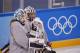 FILE - In this Feb. 4, 2018, file photo, United States goalies Alex Rigsby, left, and Nicole Hensley chat during a training session prior to the 2018 Winter Olympics in Gangneung, South Korea. Robb Stauber knows who he plans to start in net when the Americans kick off their quest for Olympic gold. The U.S. coach simply chooses not to share that information just yet. Not that waiting to hear who gets the honor of playing Sunday, Feb. 11, against Finland is bothering Maddie Rooney, Rigsby or Hensley. (AP Photo/Jae C. Hong, File)