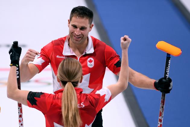 GANGNEUNG, SOUTH KOREA - FEBRUARY 12:  John Morris of Canada celebrates an 8-4 win over Norway with Kaitlyn Lawes during the Curling Mixed Doubles Semi-Finals Session One at Gangneung Curling Centre on February 12, 2018 in Gangneung, South Korea.  (Photo by Harry How/Getty Images)