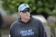 Carolina Panthers' offensive coordinator Mike Shula walks to practice during the NFL football team's rookie camp in Charlotte, N.C., Friday, May 5, 2017. (AP Photo/Chuck Burton)
