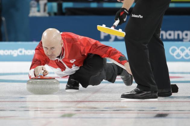 Canada's skip Kevin Koe throws a rock during a men's curling match against Italy at the 2018 Winter Olympics in Gangneung, South Korea, Wednesday, Feb. 14, 2018. (AP Photo/Natacha Pisarenko)