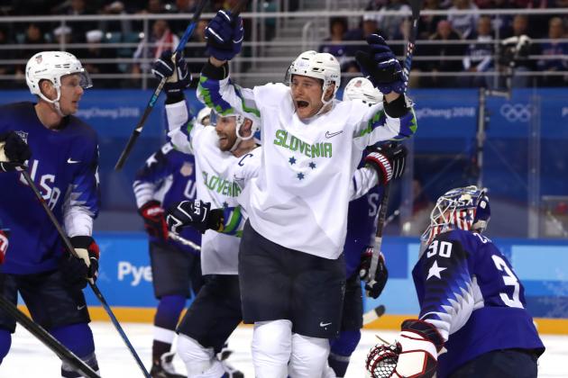 GANGNEUNG, SOUTH KOREA - FEBRUARY 14:  Jan Urbas #26 of Slovenia celebrates a goal scored by Blaz Gregorc #15 against Ryan Zapolski #30 of the United States in the third period during the Men's Ice Hockey Preliminary Round Group B game on day five of the PyeongChang 2018 Winter Olympics at Kwandong Hockey Centre on February 14, 2018 in Gangneung, South Korea.  (Photo by Ronald Martinez/Getty Images)
