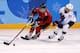 GANGNEUNG, SOUTH KOREA - FEBRUARY 15: Laura Fortino #8 of Canada handles the puck against Danielle Cameranesi #24 of the United States during the Women's Ice Hockey Preliminary Round Group A game on day six of the PyeongChang 2018 Winter Olympic Games at Kwandong Hockey Centre on February 15, 2018 in Gangneung, South Korea. (Photo by Maddie Meyer/Getty Images)