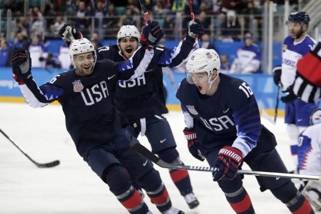 Ryan Donato (16), of the United States, celebrates after scoring a goal against Slovakia during the first period of the preliminary round of the men's hockey game at the 2018 Winter Olympics in Gangneung, South Korea, Friday, Feb. 16, 2018. (AP Photo/Julio Cortez)