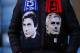 LONDON, ENGLAND - NOVEMBER 05: A fan wearing a scarf with the faces of Antonio Conte manager / head coach of Chelsea and Jose Mourinho the head coach / manager of Manchester United before the Premier League match between Chelsea and Manchester United at Stamford Bridge on November 5, 2017 in London, England. (Photo by Catherine Ivill - AMA/Getty Images)