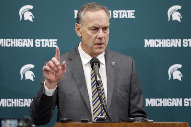 Michigan State football coach Mark Dantonio addresses reporters in response to an ESPN report detailing various allegations involving Michigan State football players before an NCAA college basketball game between Michigan State and Wisconsin, Friday, Jan. 26, 2018, in East Lansing, Mich. (AP Photo/Al Goldis)