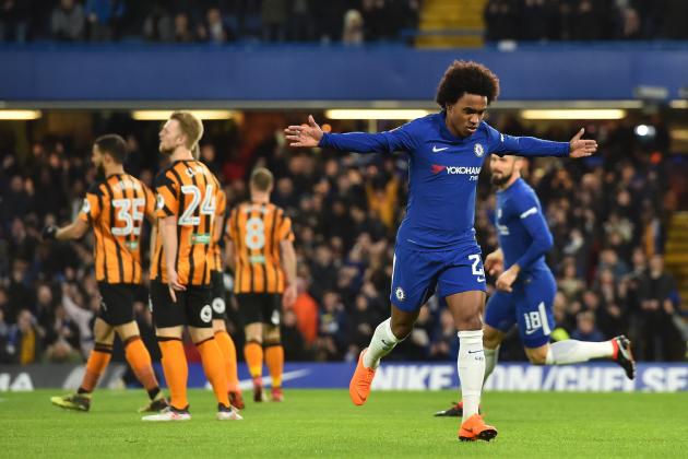 Chelsea's Brazilian midfielder Willian (R) celebrates scoring the team's first goal during the English FA Cup fifth round football match between Chelsea and Hull City at Stamford Bridge in London on February 16, 2018. / AFP PHOTO / Glyn KIRK / RESTRICTED TO EDITORIAL USE. No use with unauthorized audio, video, data, fixture lists, club/league logos or 'live' services. Online in-match use limited to 75 images, no video emulation. No use in betting, games or single club/league/player publications.  /         (Photo credit should read GLYN KIRK/AFP/Getty Images)