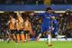 Chelsea's Brazilian midfielder Willian (R) celebrates scoring the team's first goal during the English FA Cup fifth round football match between Chelsea and Hull City at Stamford Bridge in London on February 16, 2018. / AFP PHOTO / Glyn KIRK / RESTRICTED TO EDITORIAL USE. No use with unauthorized audio, video, data, fixture lists, club/league logos or 'live' services. Online in-match use limited to 75 images, no video emulation. No use in betting, games or single club/league/player publications. / (Photo credit should read GLYN KIRK/AFP/Getty Images)