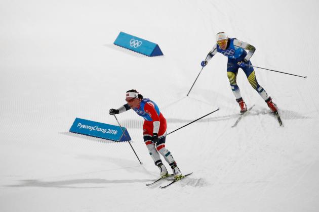 Norway's Marit Bjorgen (L) leads ahead of Sweden's Stina Nilsson during the women's 4x5km classic free style cross country relay at the Alpensia cross country ski centre during the Pyeongchang 2018 Winter Olympic Games on February 17, 2018 in Pyeongchang. / AFP PHOTO / Odd ANDERSEN (Photo credit should read ODD ANDERSEN/AFP/Getty Images)
