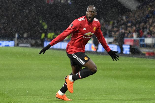 Manchester United's Belgian striker Romelu Lukaku celebrates scoring the opening goal of the English FA Cup fifth round football match between Huddersfield Town and Manchester United at the John Smith's stadium in Huddersfield, northern England on February 17, 2018. / AFP PHOTO / Oli SCARFF / RESTRICTED TO EDITORIAL USE. No use with unauthorized audio, video, data, fixture lists, club/league logos or 'live' services. Online in-match use limited to 75 images, no video emulation. No use in betting, games or single club/league/player publications. / (Photo credit should read OLI SCARFF/AFP/Getty Images)