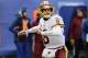 FILE - In this Dec. 31, 2017, file photo, Washington Redskins quarterback Kirk Cousins (8) throws a pass during the first half of an NFL football game against the New York Giants in East Rutherford, N.J. Cousins says he is likely to wait until March for any possible negotiations with the Washington Redskins, indicating he would first make the team decide whether to apply a transition or franchise tag on him for the third year in a row. Appearing at a fan forum aired live on 106.7 The Fan, the local radio station on which the quarterback makes weekly regular-season appearances, Cousins said Friday, Jan. 5, 2018, he believes the Redskins are