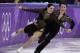 Tessa Virtue and Scott Moir of Canada perform during the ice dance, short dance figure skating in the Gangneung Ice Arena at the 2018 Winter Olympics in Gangneung, South Korea, Monday, Feb. 19, 2018. (AP Photo/Julie Jacobson)