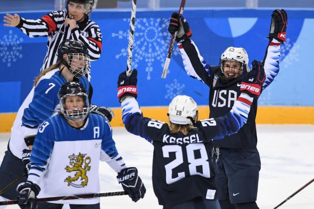 US Danielle Cameranesi (R) celebrates after scoring a goal in the women's ice hockey semifinal game between the United States and Finland during the Pyeongchang 2018 Winter Olympic Games at the Gangneung Hockey Centre in Gangneung on February 19, 2018. / AFP PHOTO / JUNG Yeon-Je        (Photo credit should read JUNG YEON-JE/AFP/Getty Images)
