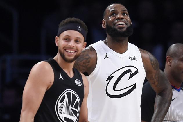 Team Stephen's Stephen Curry, left, of the Golden State Warriors, and Team LeBron's LeBron James, of the Cleveland Cavaliers, stand together during the first half of an NBA All-Star basketball game, Sunday, Feb. 18, 2018, in Los Angeles. (AP Photo/Chris Pizzello)