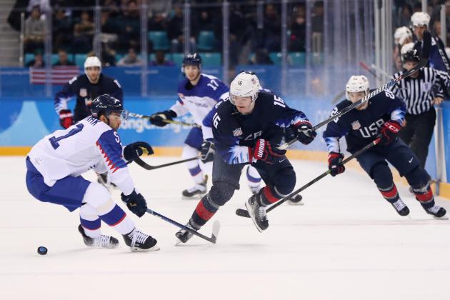 GANGNEUNG, SOUTH KOREA - FEBRUARY 16:  Ryan Donato #16 of the United States and Dominik Granak #51 of Slovakia go for the puck during the Men's Ice Hockey Preliminary Round Group B game at Gangneung Hockey Centre on February 16, 2018 in Gangneung, South Korea.  (Photo by Jamie Squire/Getty Images)