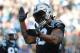 CHARLOTTE, NC - DECEMBER 24: Julius Peppers #90 of the Carolina Panthers reacts after a play against the Tampa Bay Buccaneers during their game at Bank of America Stadium on December 24, 2017 in Charlotte, North Carolina. (Photo by Streeter Lecka/Getty Images)