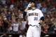 Arizona Diamondbacks' J.D. Martinez points upward after hitting a grand slam against the San Francisco Giants during the second inning of a baseball game, Tuesday, Sept. 26, 2017, in Phoenix. (AP Photo/Matt York)