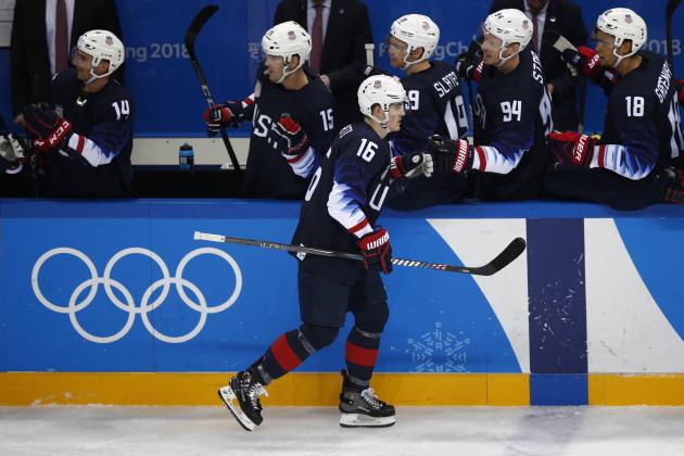 Ryan Donato (16), of the United States, celebrates his teammates after scoring a goal against Slovakia during the second period of the qualification round of the men's hockey game at the 2018 Winter Olympics in Gangneung, South Korea, Tuesday, Feb. 20, 2018. (AP Photo/Jae C. Hong)