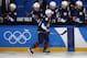 Ryan Donato (16), of the United States, celebrates his teammates after scoring a goal against Slovakia during the second period of the qualification round of the men's hockey game at the 2018 Winter Olympics in Gangneung, South Korea, Tuesday, Feb. 20, 2018. (AP Photo/Jae C. Hong)
