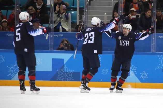 GANGNEUNG, SOUTH KOREA - FEBRUARY 20:  Mark Arcobello #26 of the United States celebrates with his teammates after scoring a goal on Jan Laco #50 of Slovakia in the second period during the Men's Play-offs Qualifications game on day eleven of the PyeongChang 2018 Winter Olympic Games at Gangneung Hockey Centre on February 20, 2018 in Gangneung, South Korea.  (Photo by Bruce Bennett/Getty Images)