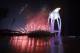 Fireworks explode behind the Olympic flame during the opening ceremony of the 2018 Winter Olympics in Pyeongchang, South Korea, Friday, Feb. 9, 2018. (AP Photo/David J. Phillip,Pool)