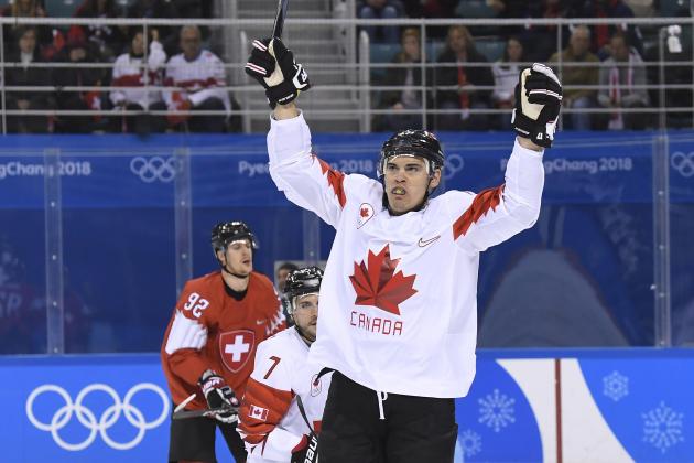 Canada's forward Rene Bourque, centre, celebrates after he scores during first period men's hockey action against Switzerland at the 2018 Olympic Winter Games in Pyeongchang, South Korea, on Thursday, February 15, 2018. (Nathan Denette/The Canadian Press via AP)